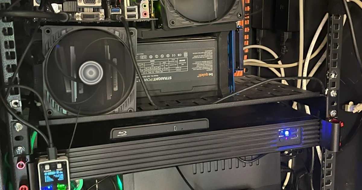 Homelab rack with creative hardware mounting and organized chaos cable management